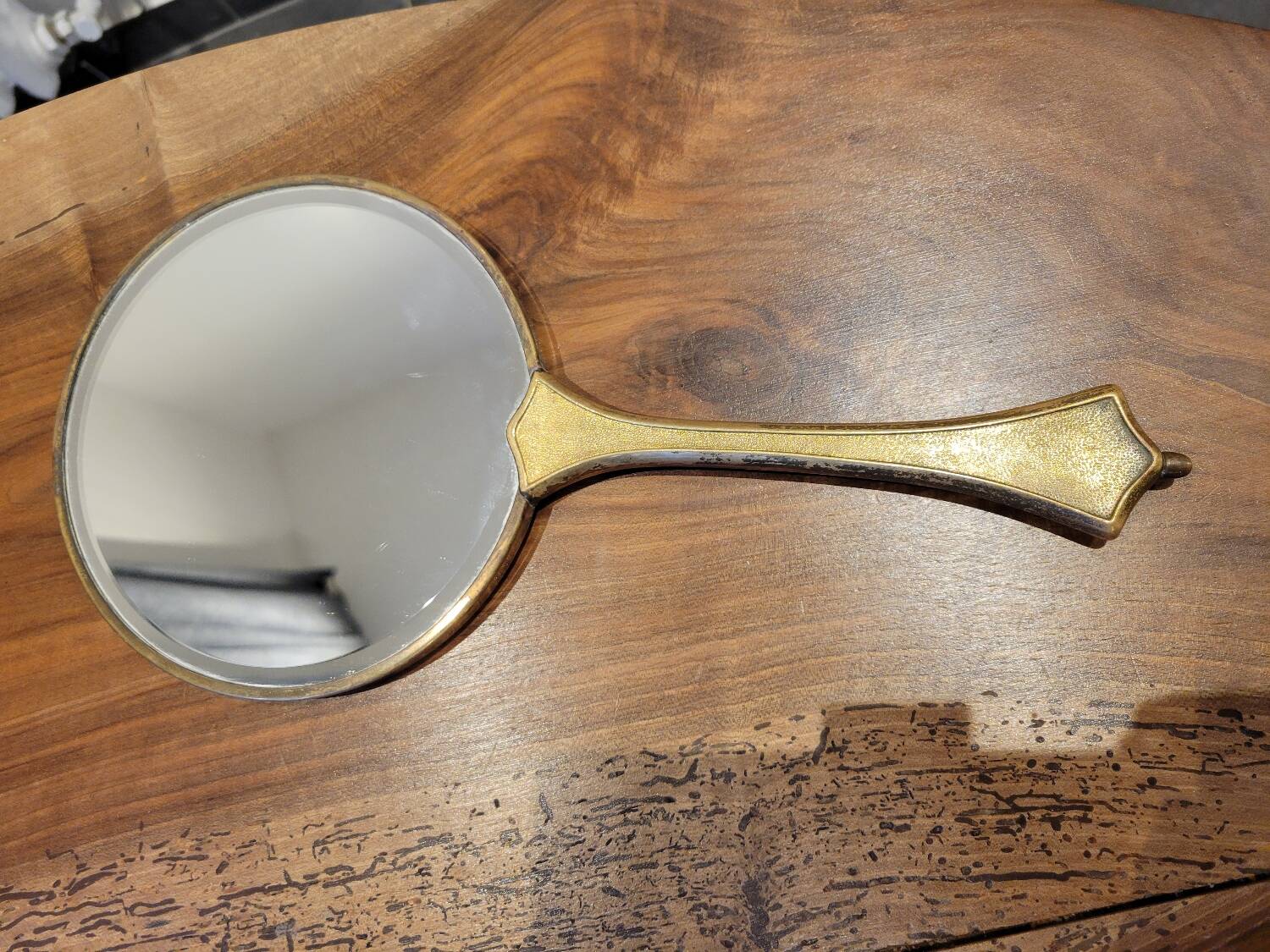 Brass hand mirror with magnifying back