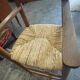 Wooden and straw high chair for children