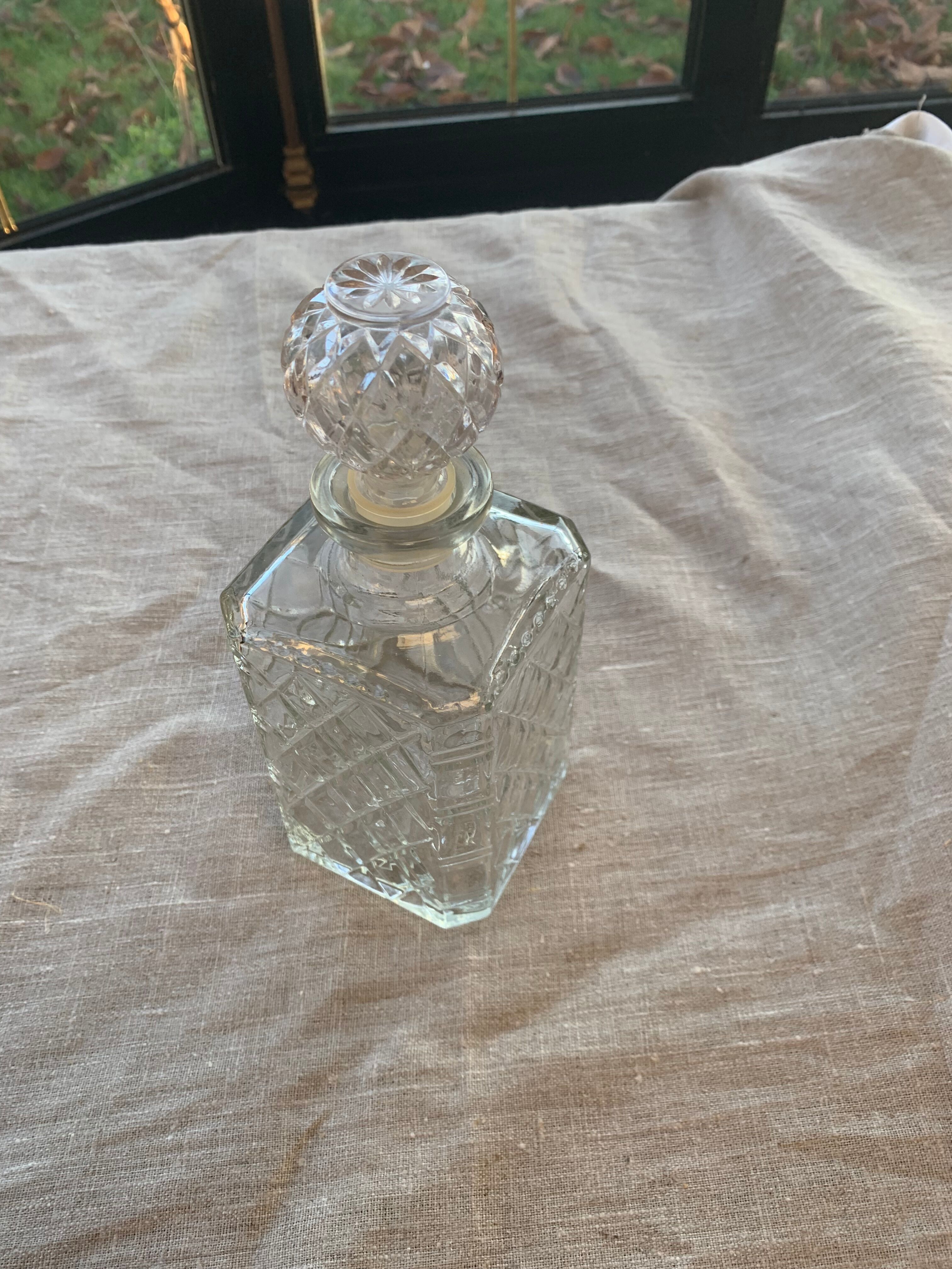Vintage transparent molded glass whisky decanter