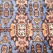 Oriental rug, size 243 x 168 cm, signed and numbered.