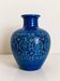 Vintage Italian vase in blue glazed ceramic, relief decoration.