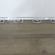 Large vintage wall-mounted coat rack in chrome metal