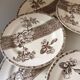 8 Terre de Fer dessert plates, 19th century