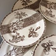 8 Terre de Fer dessert plates, 19th century