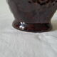 Vase en céramique orange marron avec coulures en relief