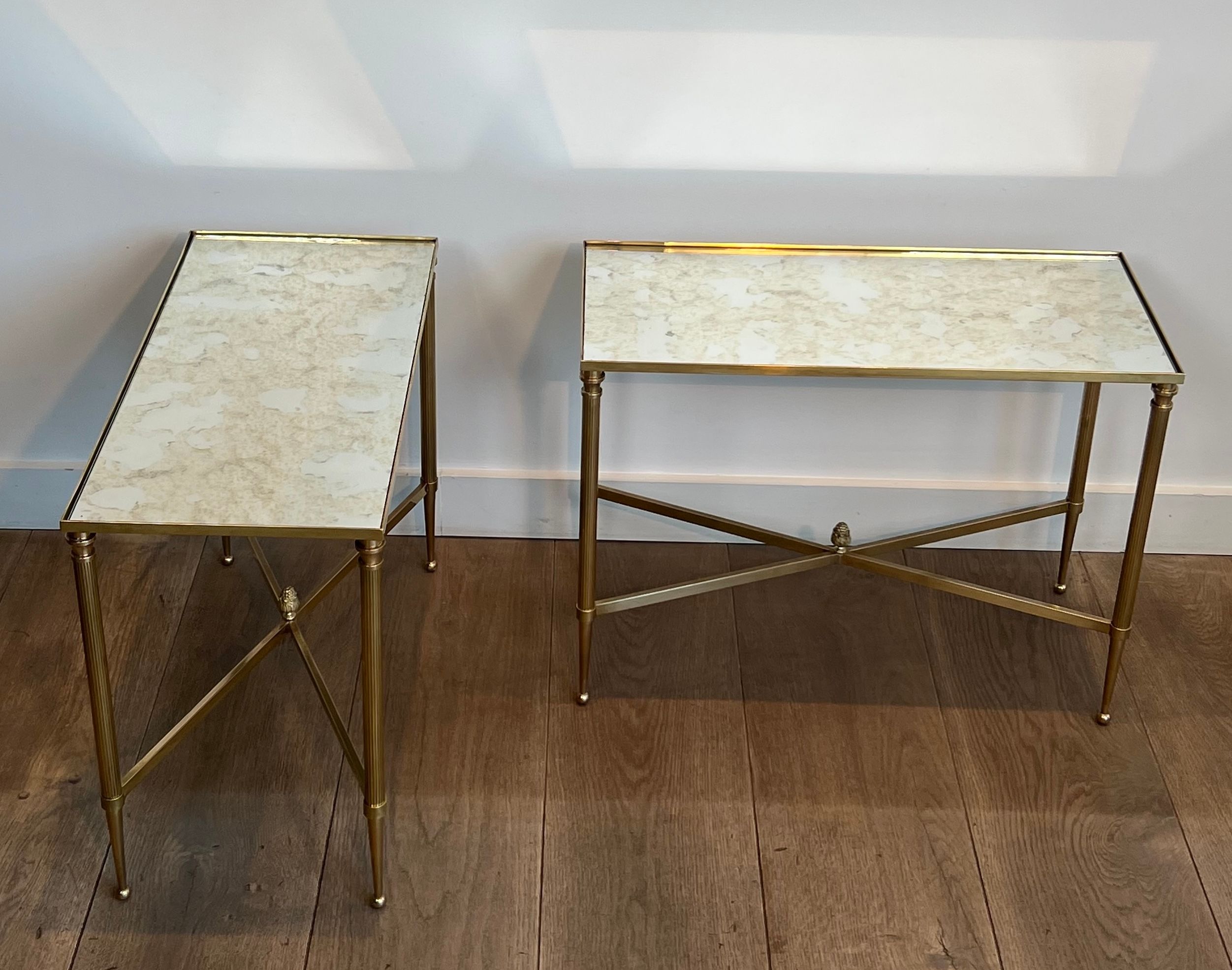 Pair of brass side tables with antique mirrored tops from Maison Jansen