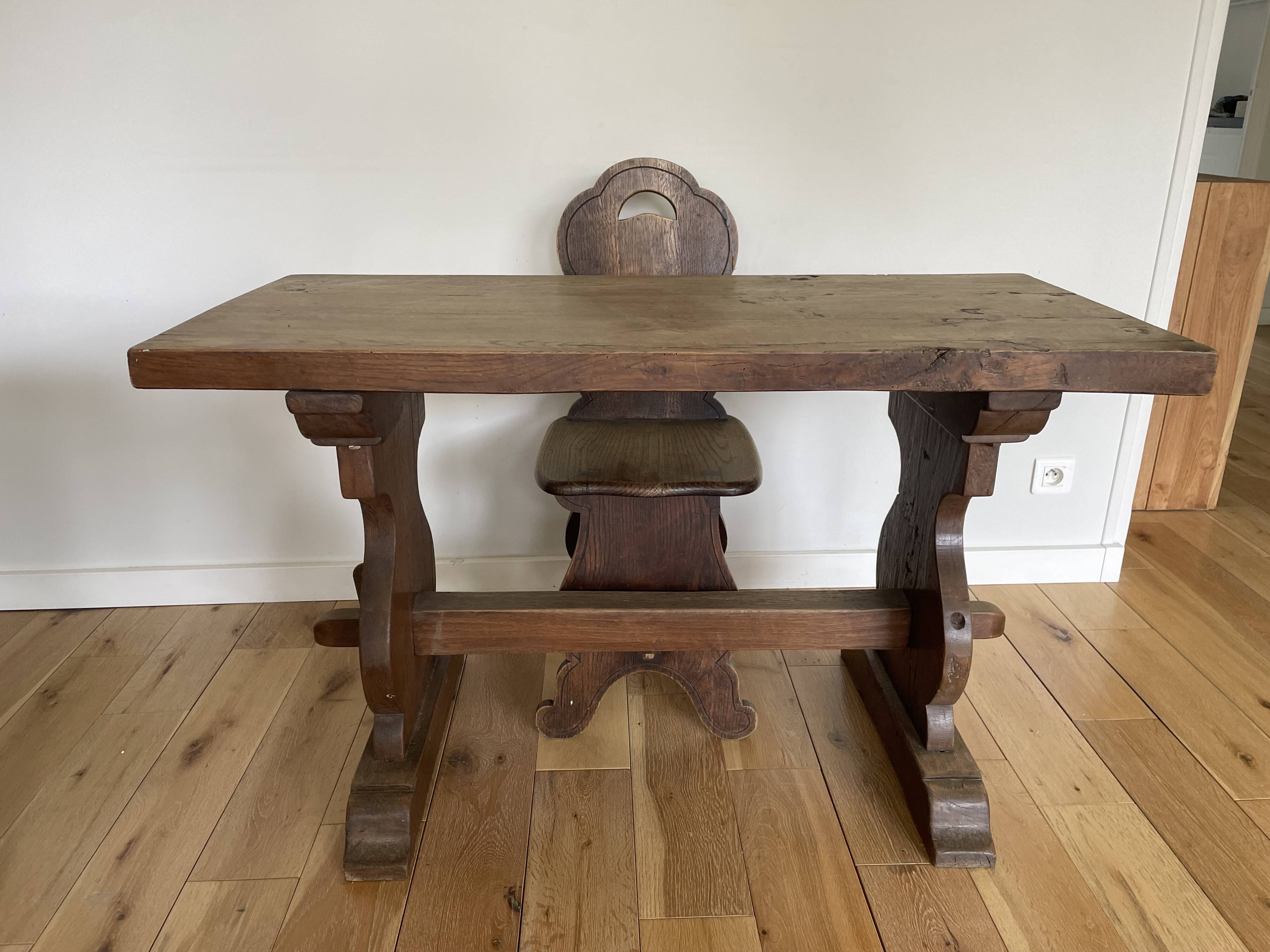Rustic Spanish table and chair from the late 19th / early 20th century in solid oak.