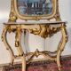 Importante console galbée + miroir style Louis XV en bois doré et laqué