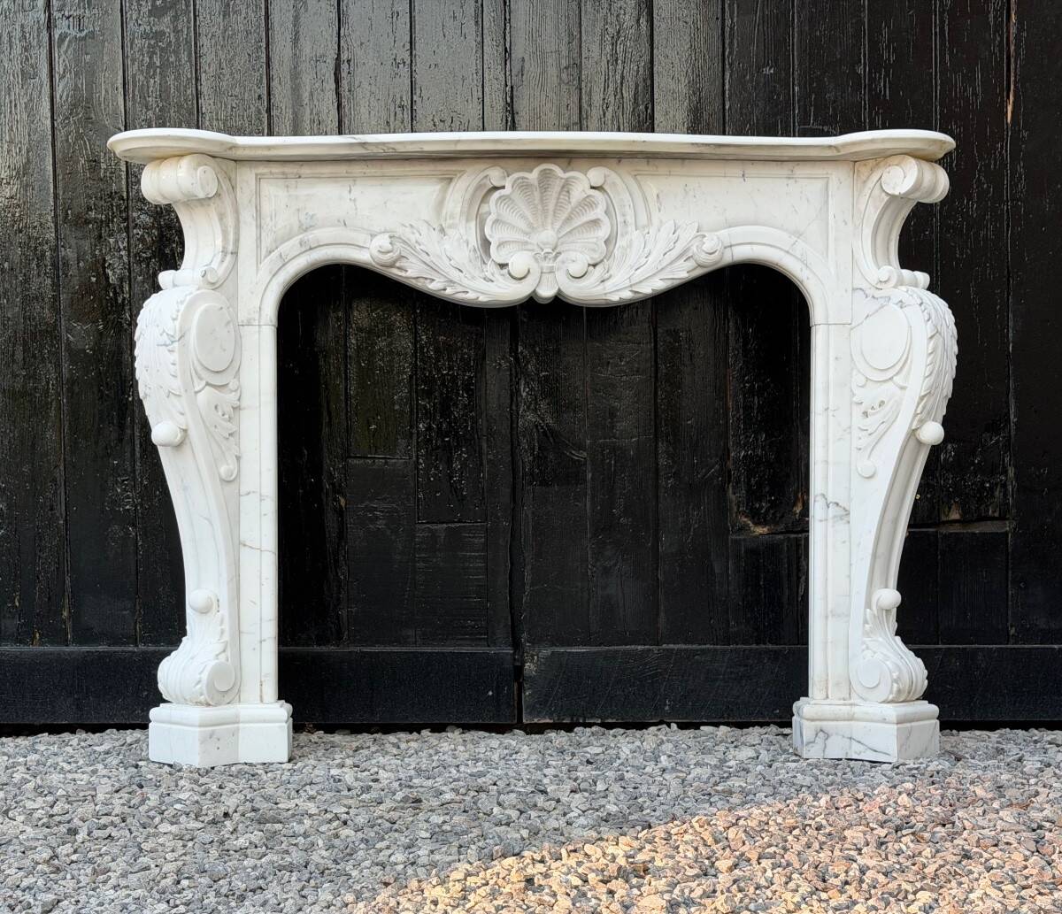 Louis XV style fireplace in Carrara marble, circa 1980.