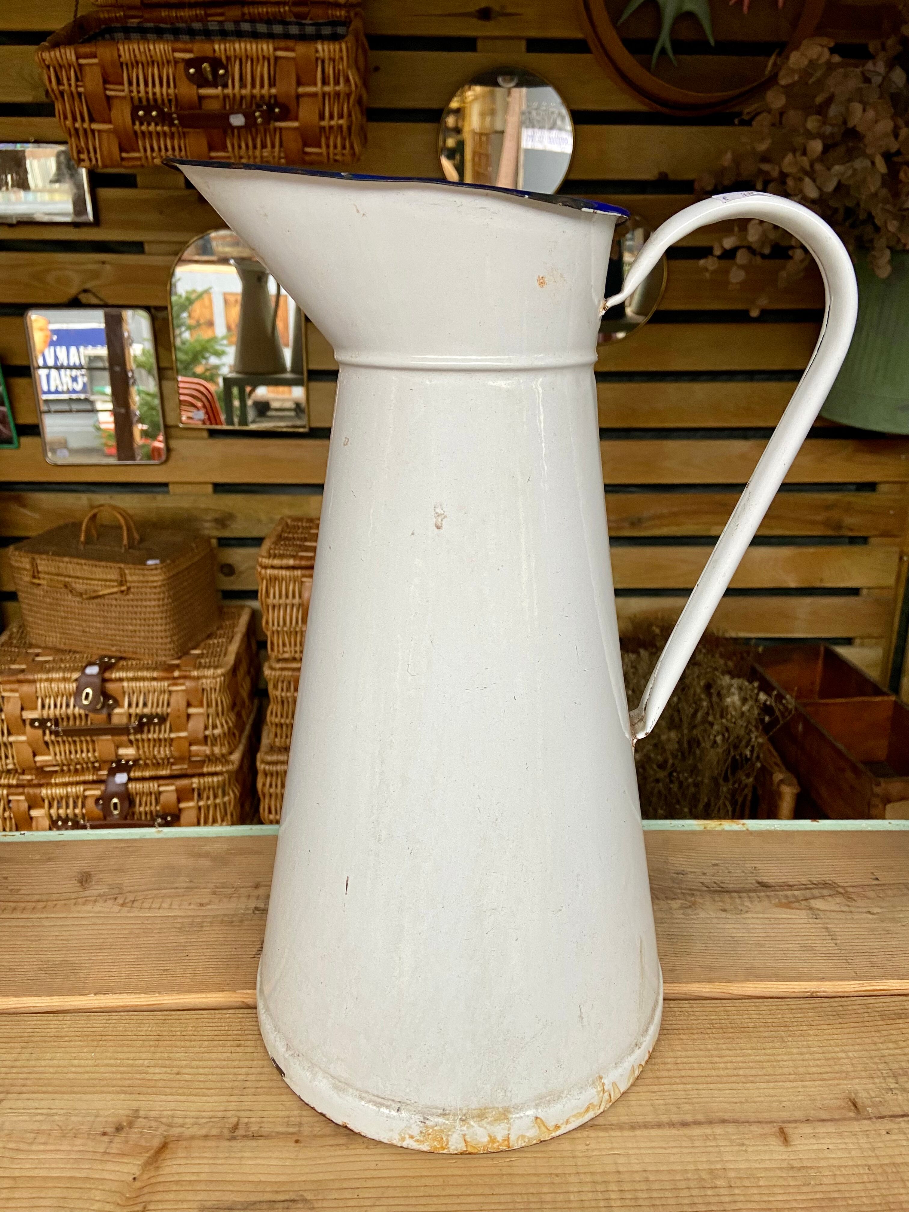 White enamelled pitcher