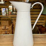 White enamelled pitcher