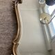 Ancien miroir et console murale en bois sculpté