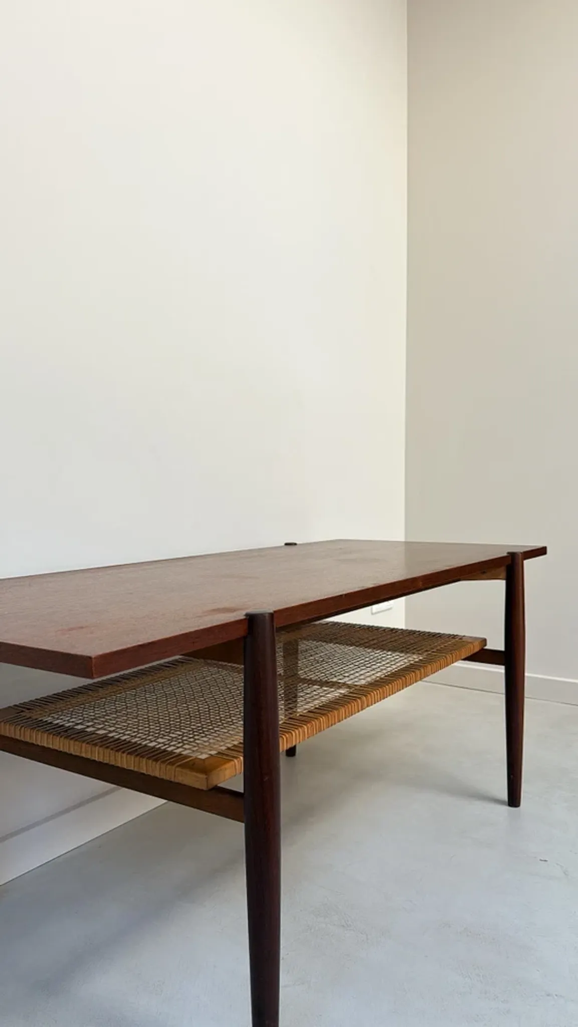 Vintage wooden coffee table with wicker lower shelf