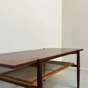 Vintage wooden coffee table with wicker lower shelf