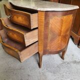 Curved chest of drawers in rosewood and marble marquetry