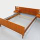 Vintage Scandinavian style double bed in teak from the 60s with integrated bedside lights