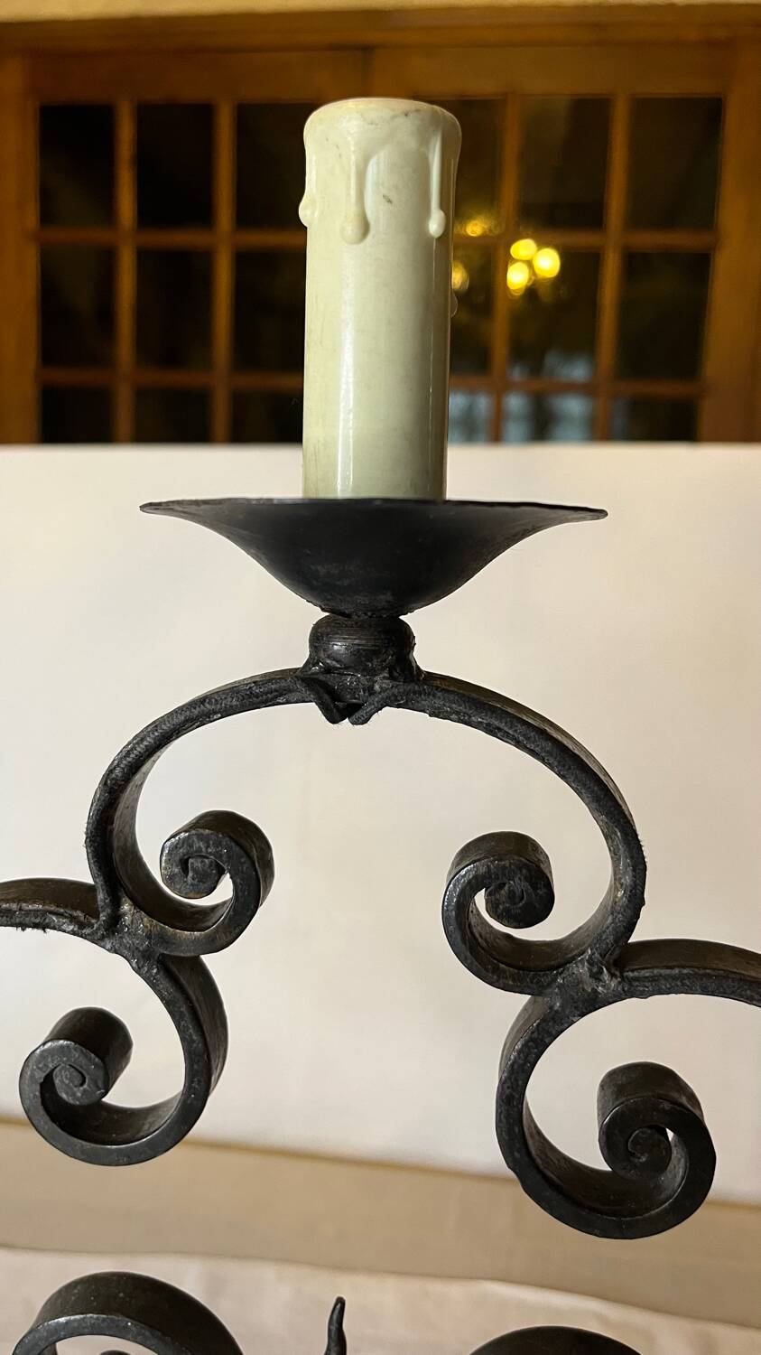 Pair of 3-light wrought iron candlesticks on vintage legs
