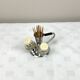 Vintage salt and pepper shakers and their chrome metal support