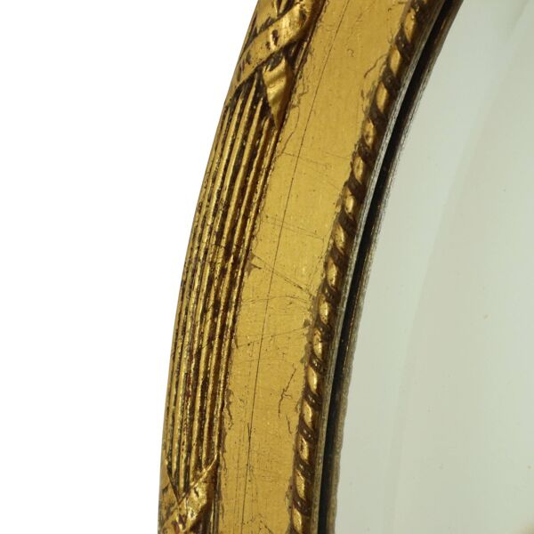 Miroir ovale à facettes françaises avec nœud classique 51 cm