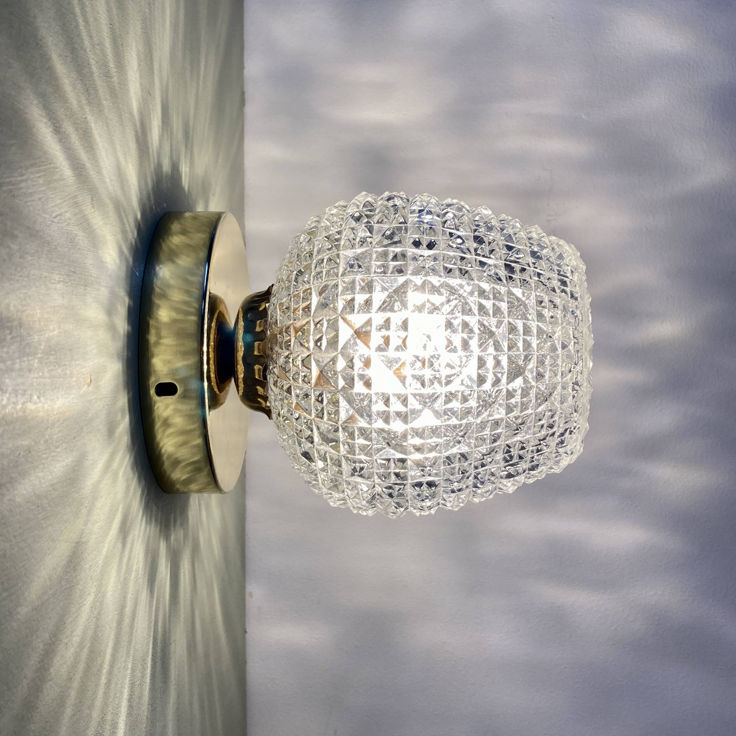 Vintage glass globe wall or ceiling light with diamond point.