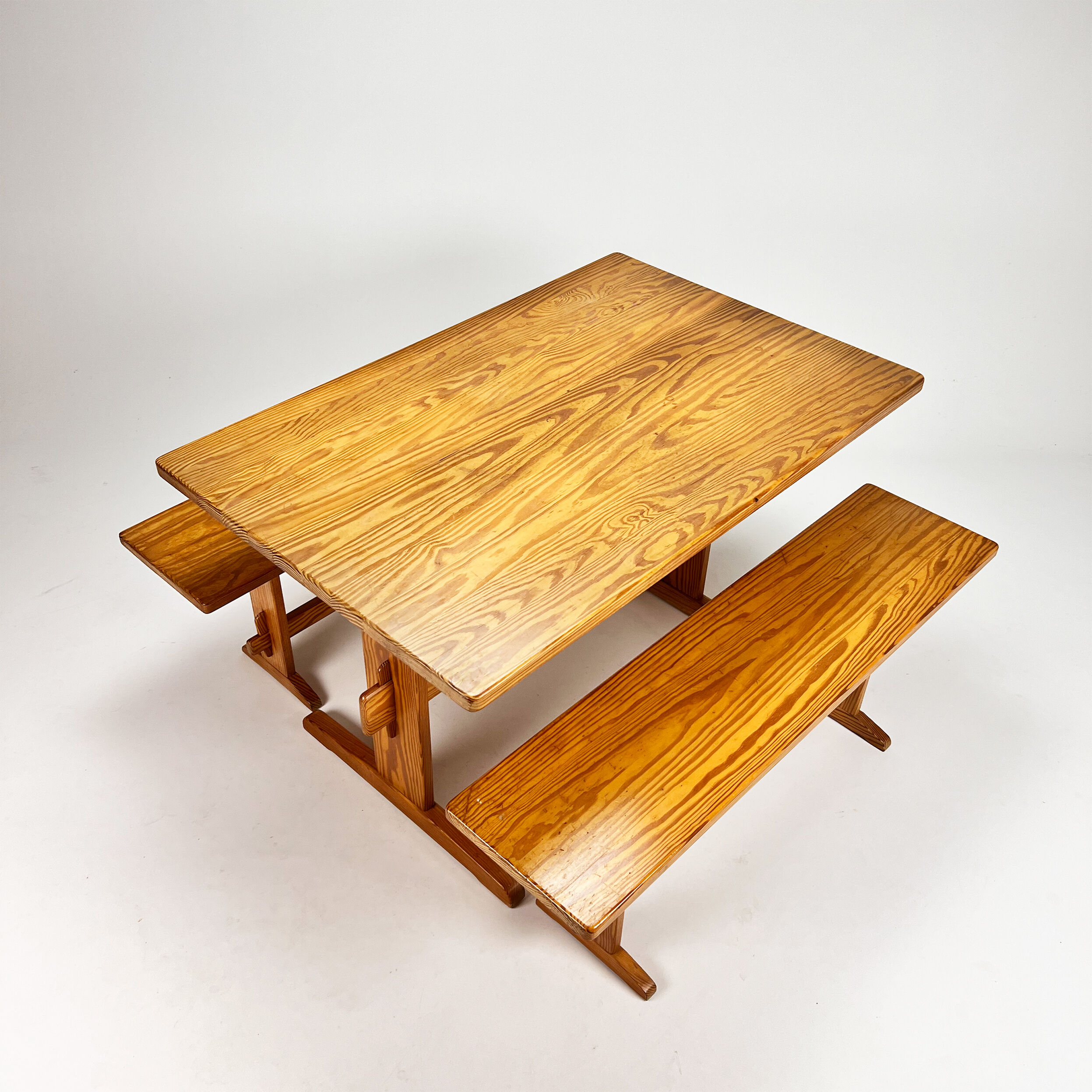 Mid century scandinavian pine dining set consists of one table and two benches, 1960s