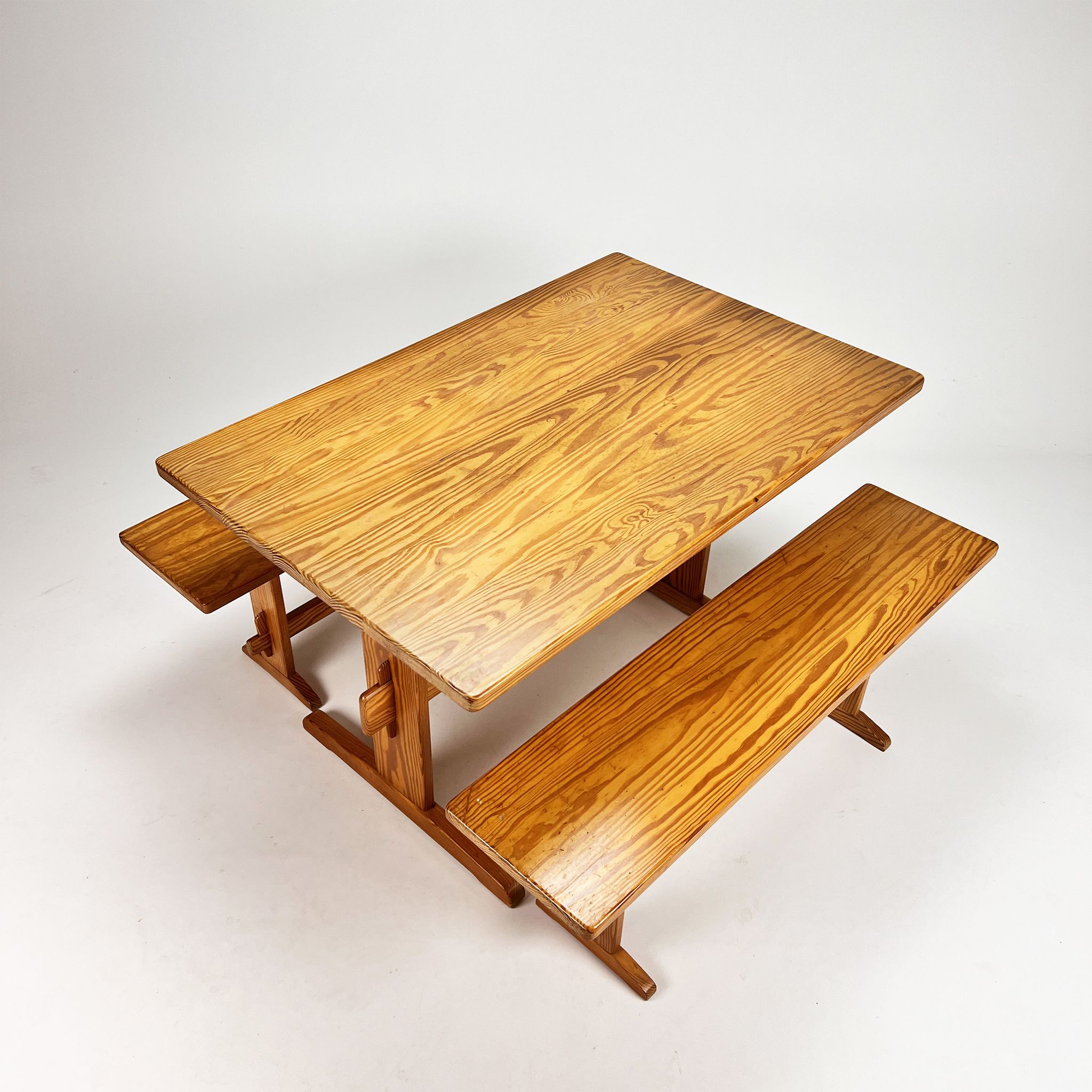 Mid century scandinavian pine dining set consists of one table and two benches, 1960s