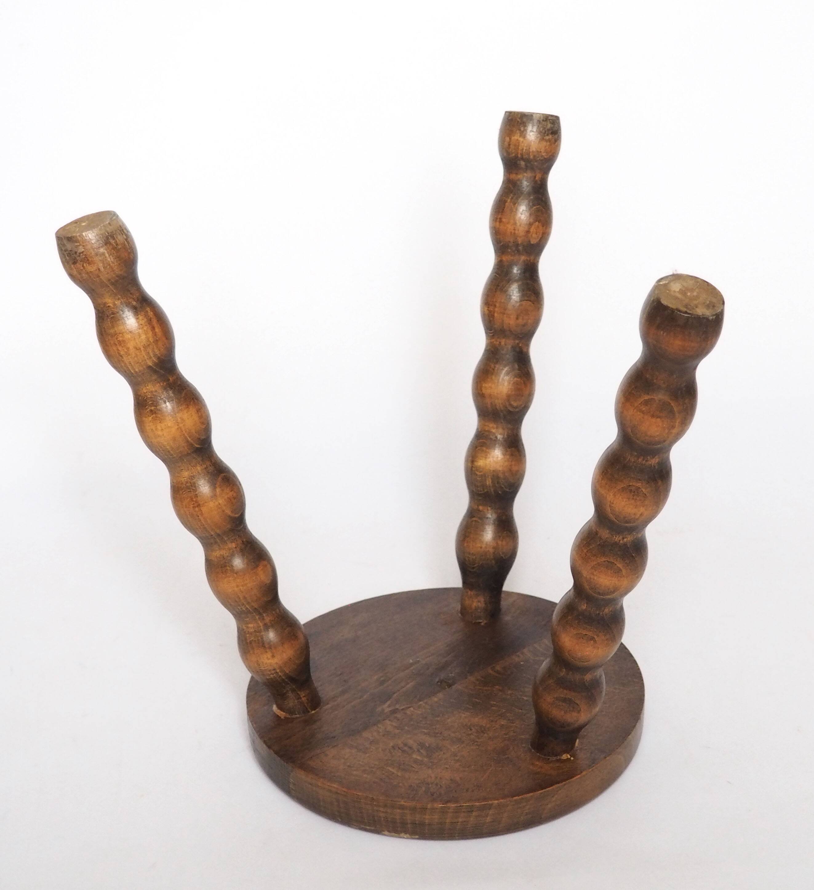Beaded wooden tripod stool