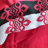 Vintage graphic red tablecloth and 8 matching napkins.