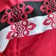 Vintage graphic red tablecloth and 8 matching napkins.