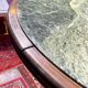 Vintage green sea marble and rosewood table from the 1970s.