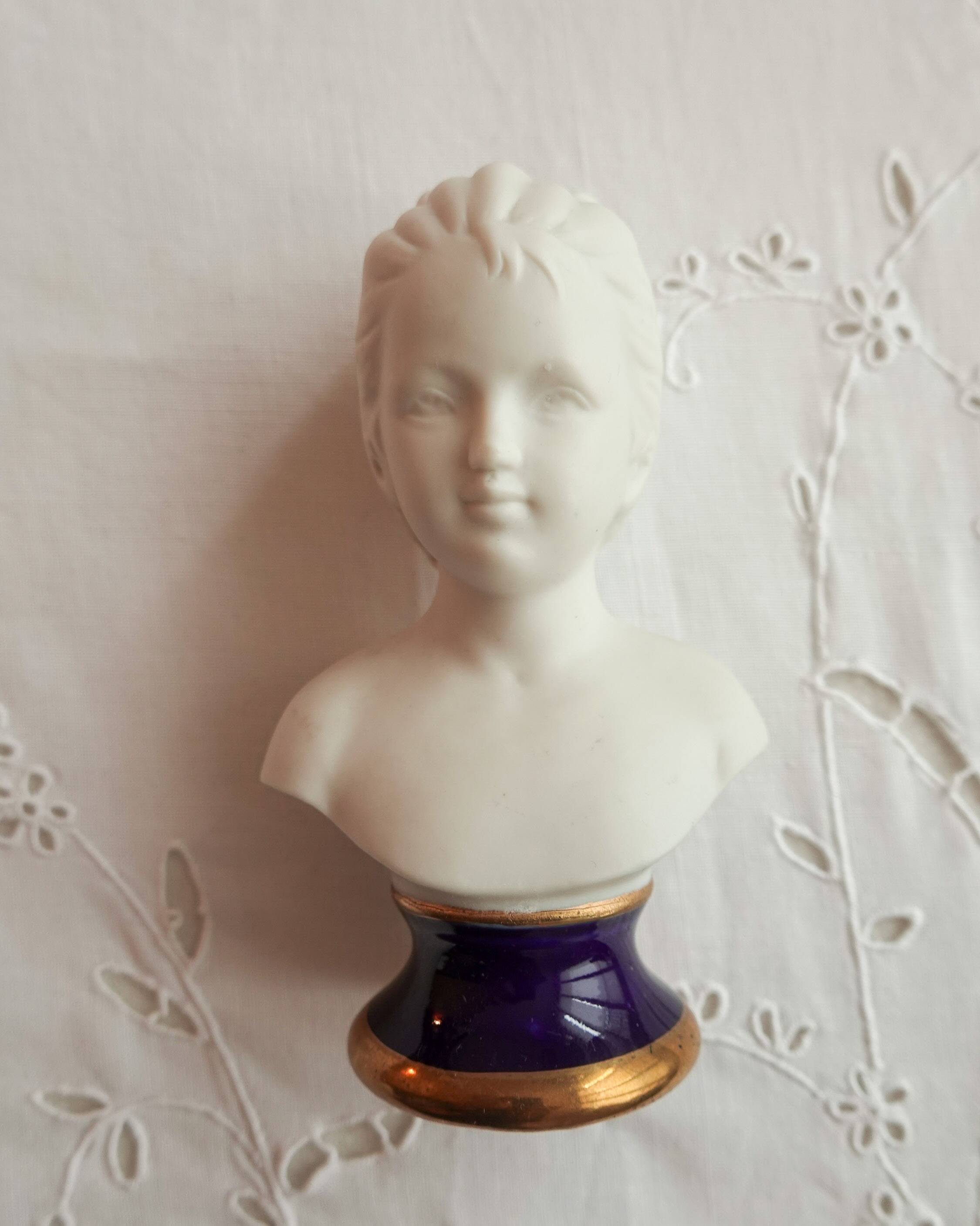 Pair of children's busts