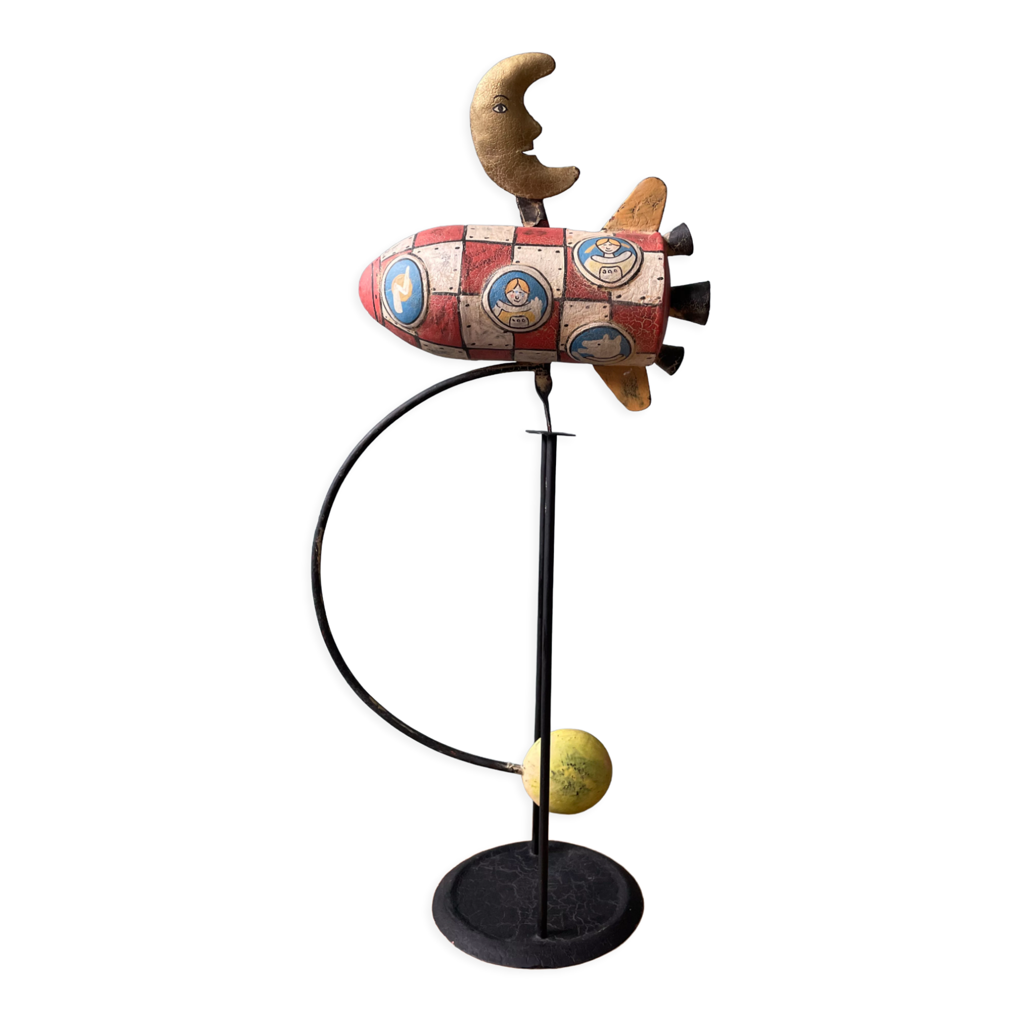 Old painted sheet metal pendulum toy