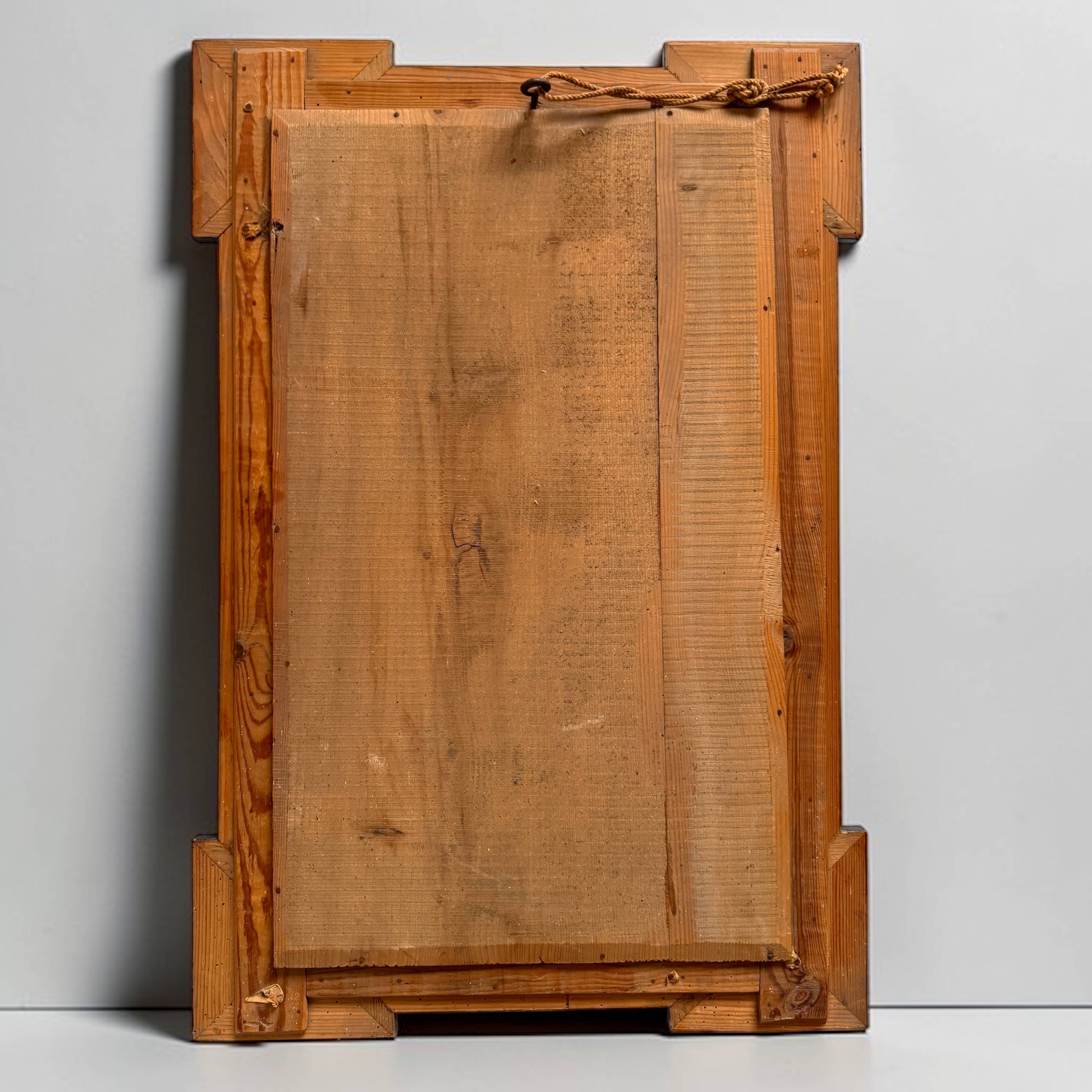 Antique wall mirror in blackened wood and gilded stucco, 19th-century Dutch style.