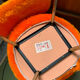 Pair of Pelfran chairs in faux orange, 1960s-70s.