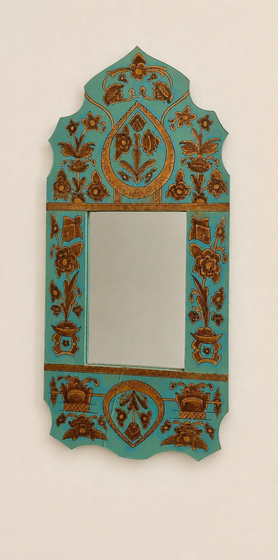 Vintage oriental wall mirror decor under glass