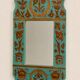 Vintage oriental wall mirror decor under glass