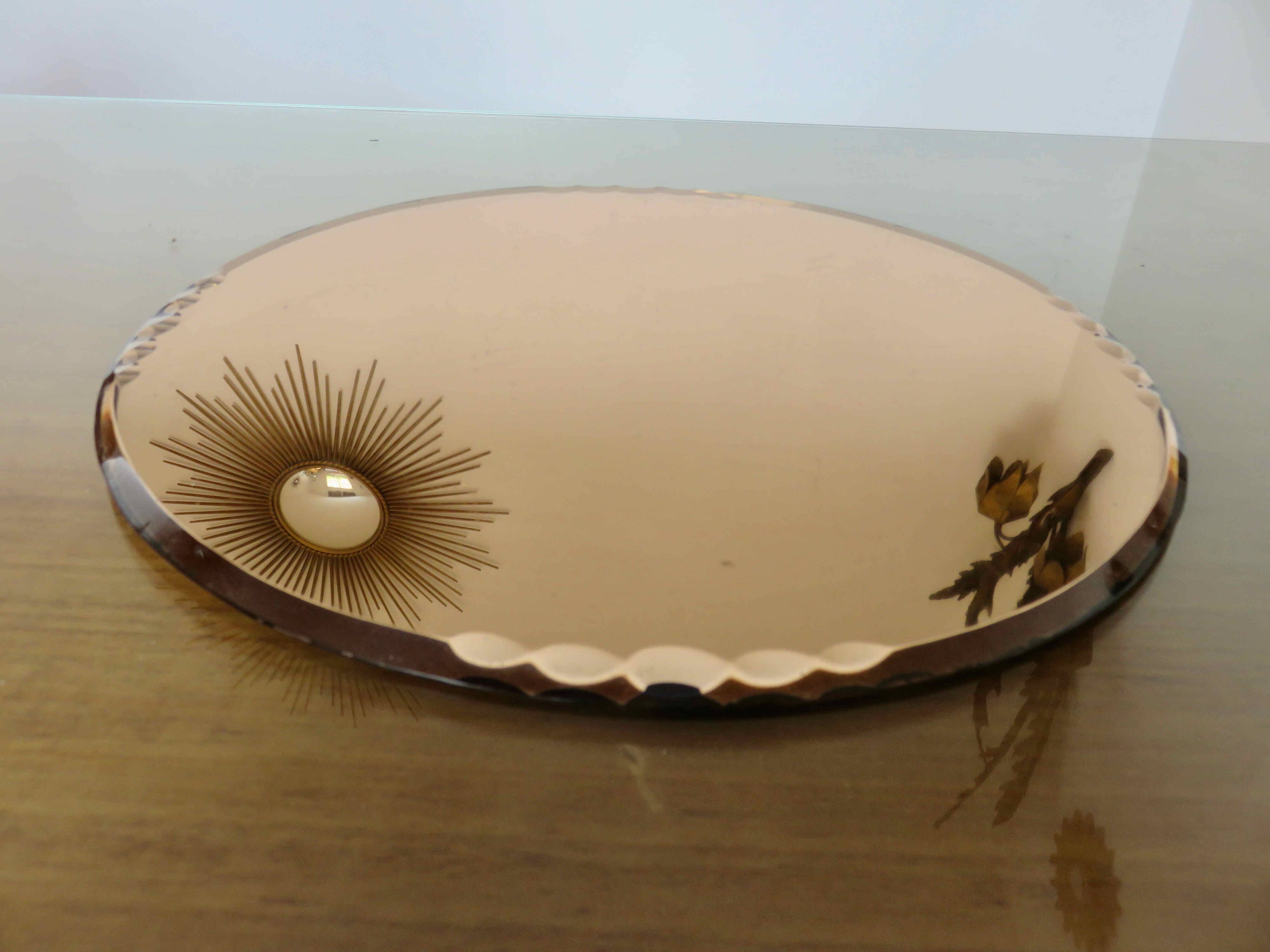 Round beveled amber pink mirror