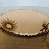 Round beveled amber pink mirror