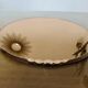 Round beveled amber pink mirror
