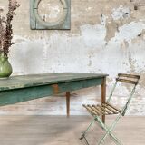 Vintage farm table with spindle legs.