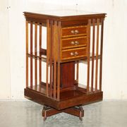 Restored Victorian walnut revolving library.