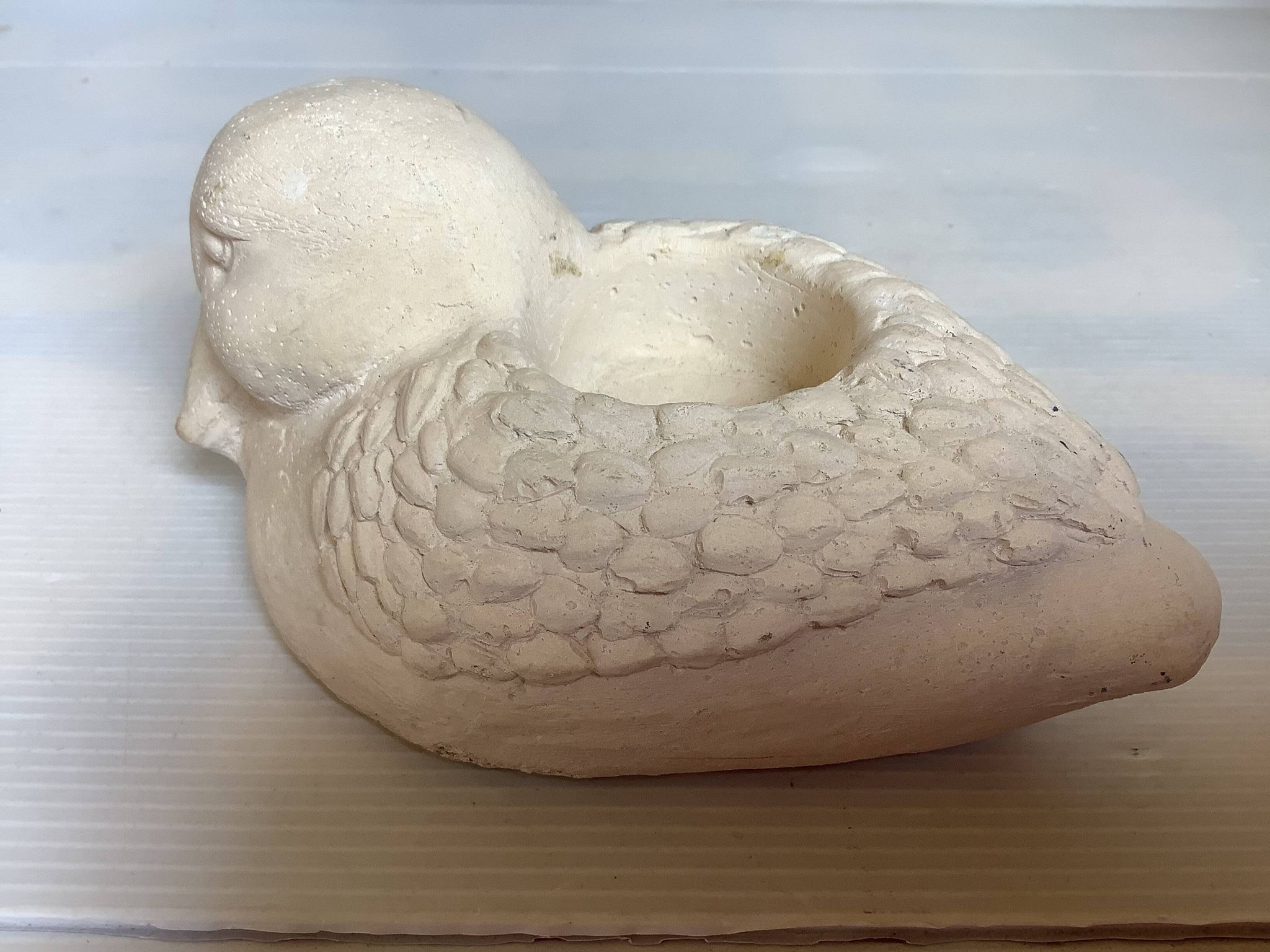 Bird candle holder for indoor or outdoor use.
