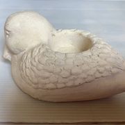 Bird candle holder for indoor or outdoor use.