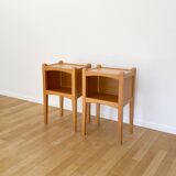 Pair of light wood bedside tables