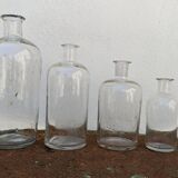 Series of 4 old bottles of herbalist