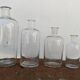 Serie de 4 flacons anciens d'herboriste