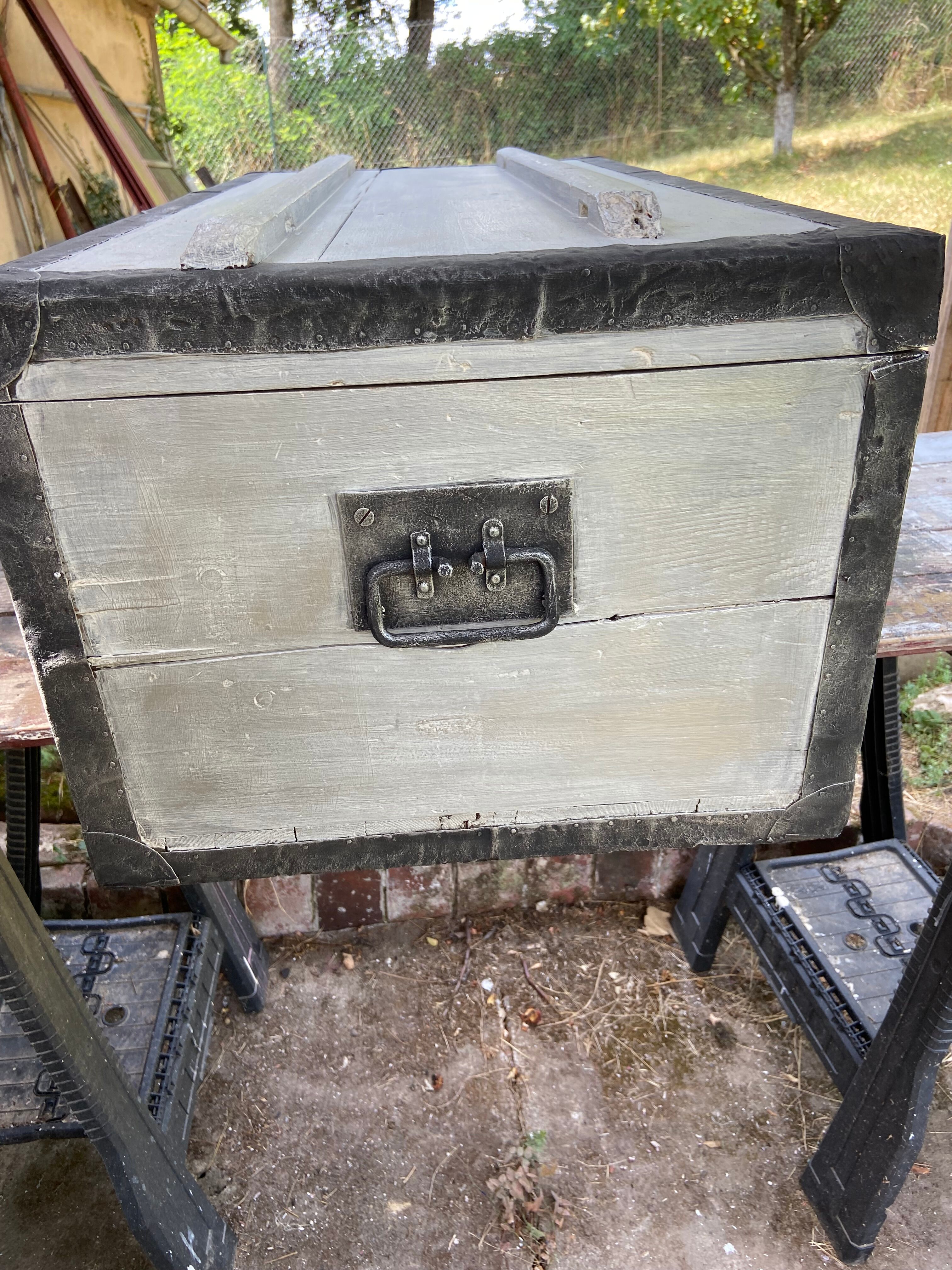 Restored wooden trunk patinated grey