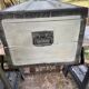Restored wooden trunk patinated grey