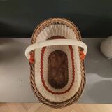 Old oval basket with a wooden base