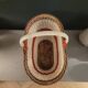 Old oval basket with a wooden base
